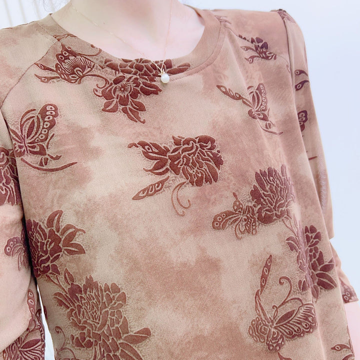 Dame mode blouse med 3/4-ærmer og blomster design Stilla