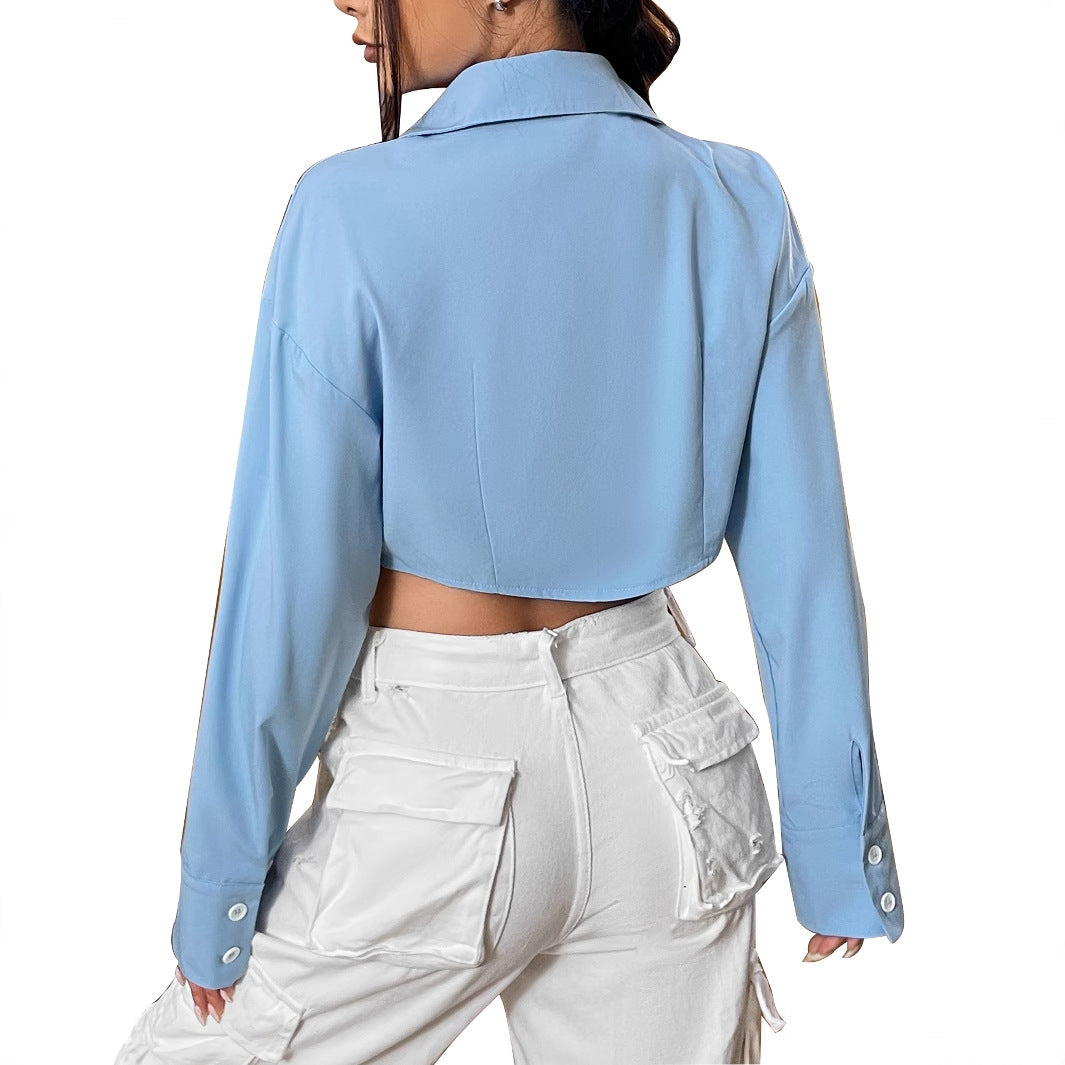Kvinder cropped bluse med brede ærmer og elegant knapstolpe Stilla