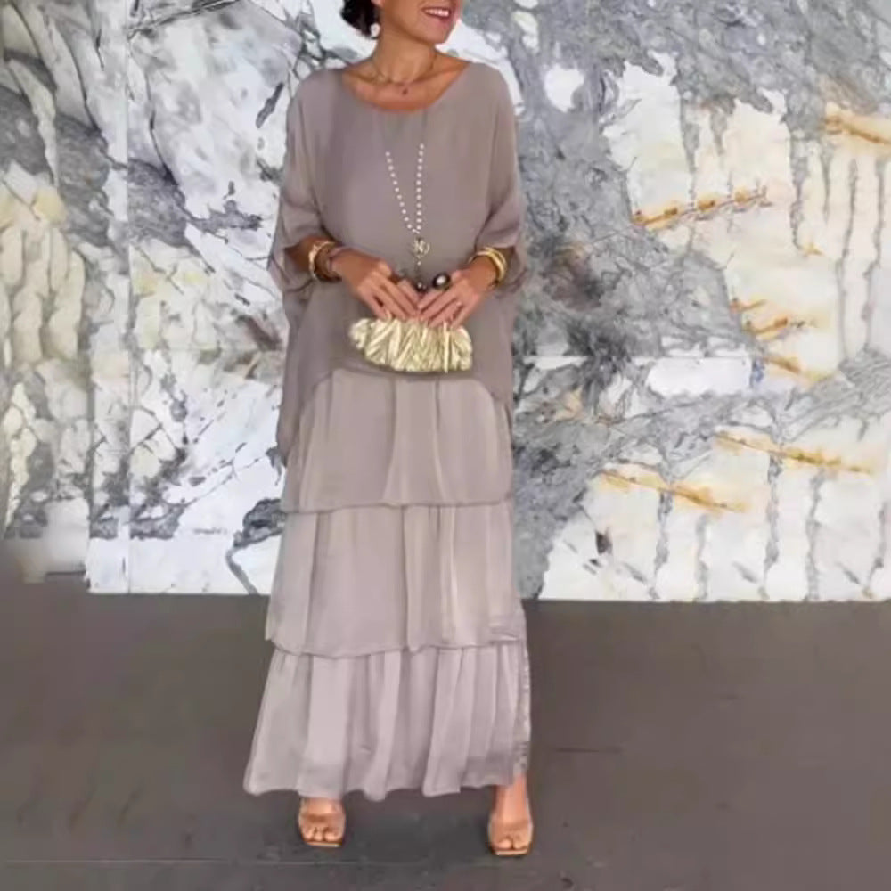Dame maxikjole med flydende skirt og elegante flæsedetaljer Stilla