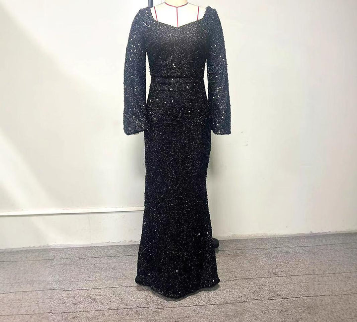 Dame Glitrende Aftenkjole med skinnende Pailletter og elegante Trompetærmer Stilla
