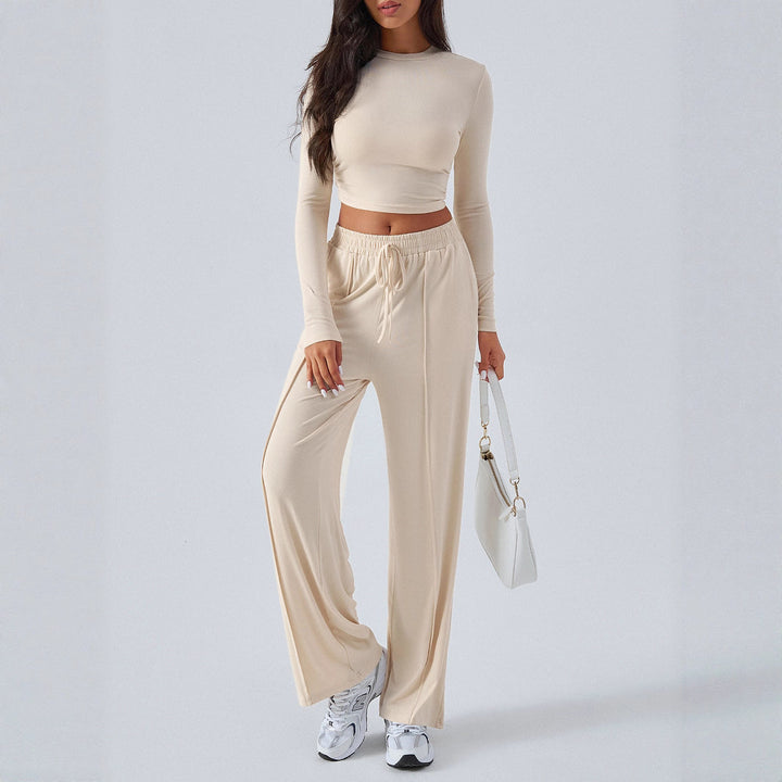 Dame sæt af elastisk crop-top og løstsiddende joggingbukser Stilla