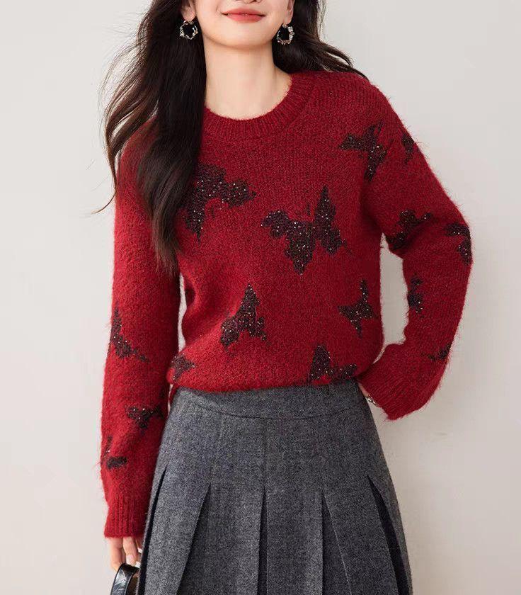 Kvinders stilfulde strikket sweater med funklende sommerfugle-applikationer Stilla