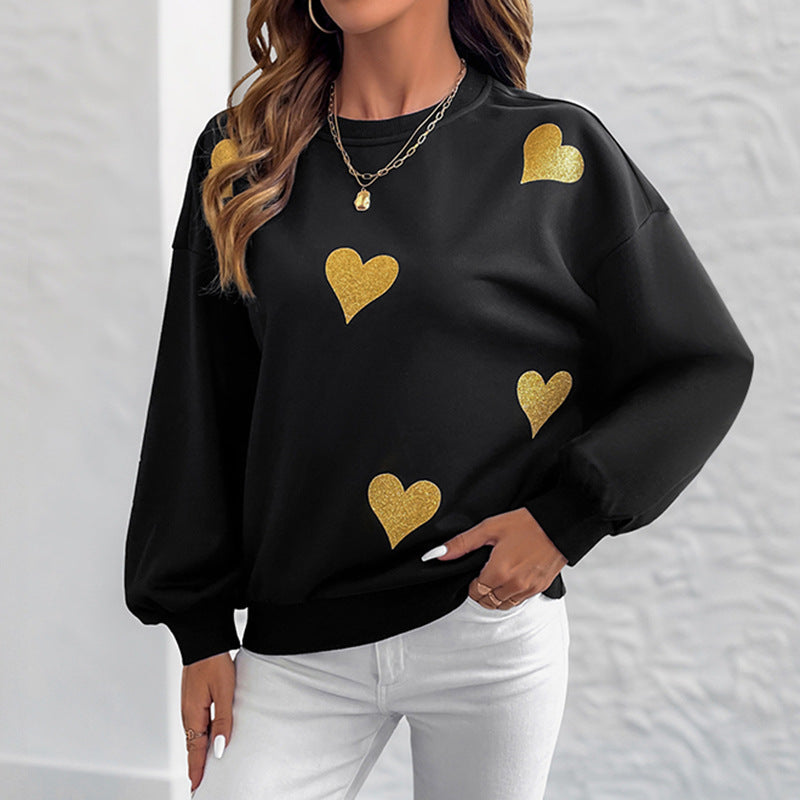Dame mode sweatshirts med gyldent hjerteprint Stilla