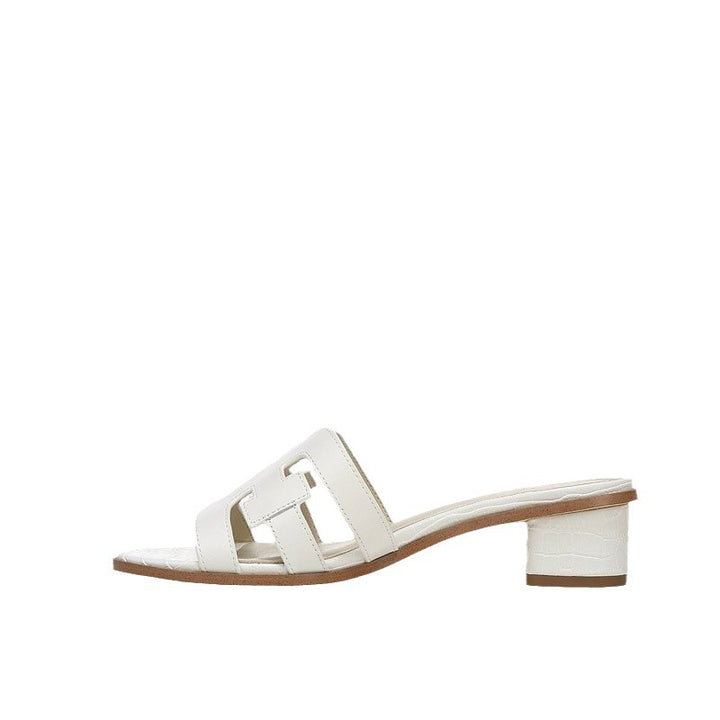 Dame mode slippers med elegant blokhæl og detaljeret designet overmateriale Stilla