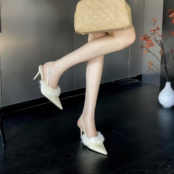 Dame Slingback-pumps med luksuriøs pelsbesætning og elegant spids design Stilla