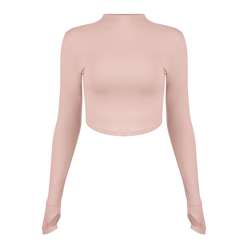 Dame sporty langærmet crop top med høj krave og åndbar struktur Stilla