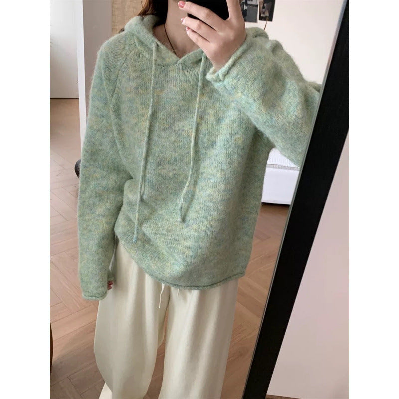 Kvinders hyggelige hætte sweatshirt lavet af blødt fleece-materiale med kengurulomme Stilla