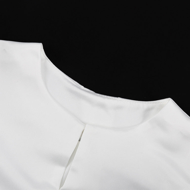Dame mode bluse med ballonformede ærmer og elegant snit Skovae