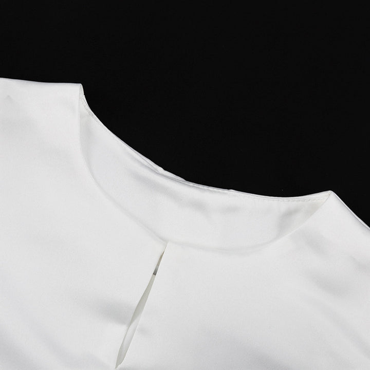 Dame mode bluse med ballonformede ærmer og elegant snit Skovae