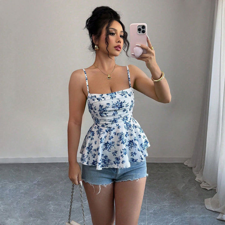 Kvindernes elegante bluse top med blomsterdesign og peplum snit Stilla