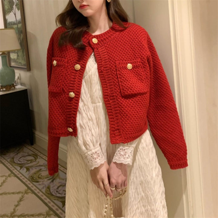 Kvinders cardigan med dekorative knapper og tekstureret design Stilla
