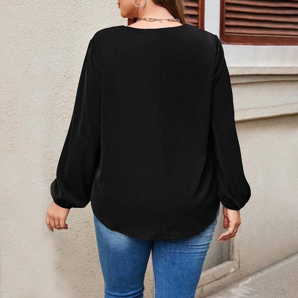 Dame afslappet bluse med stilfulde voluminøse ærmer og elegant V-hals Stilla