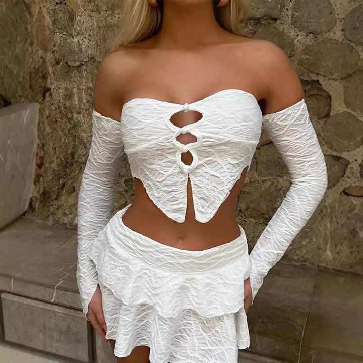 Dame cropped top med unikt knude design og raffinerede ærmer Skovae