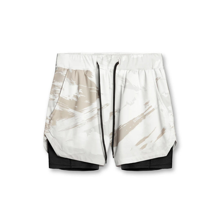 Damer Sportslige Dobbelt-shorts med integreret kompressionsunderbukser og elastisk talje Stilla