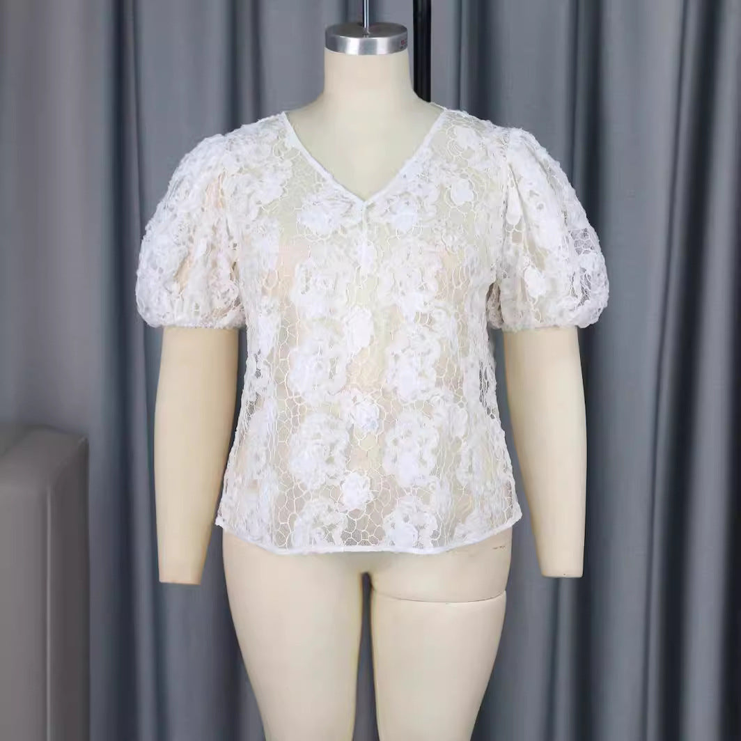 Damebluse med romantiske spidsærmer og blomstret mønster Skovae