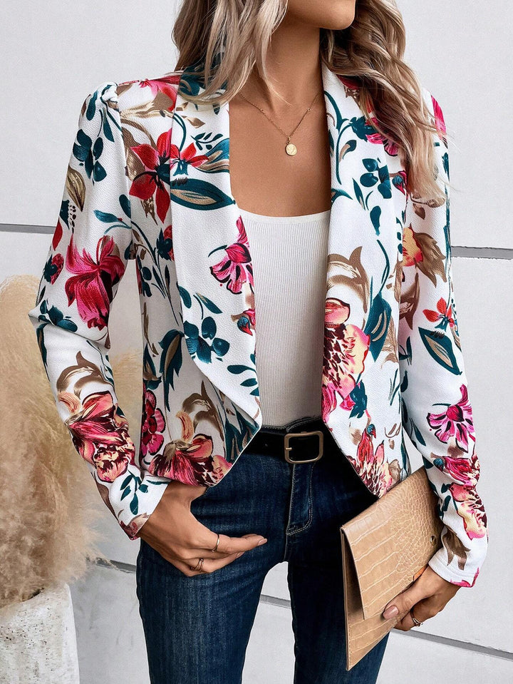 Dame blazer med blomster mønster og raffinerede puffærmer Stilla