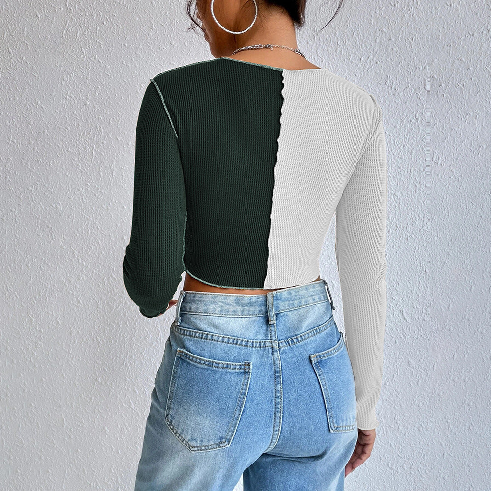 Kvinders cropped langærmet skjorte med to farver og fashionable rib design Stilla
