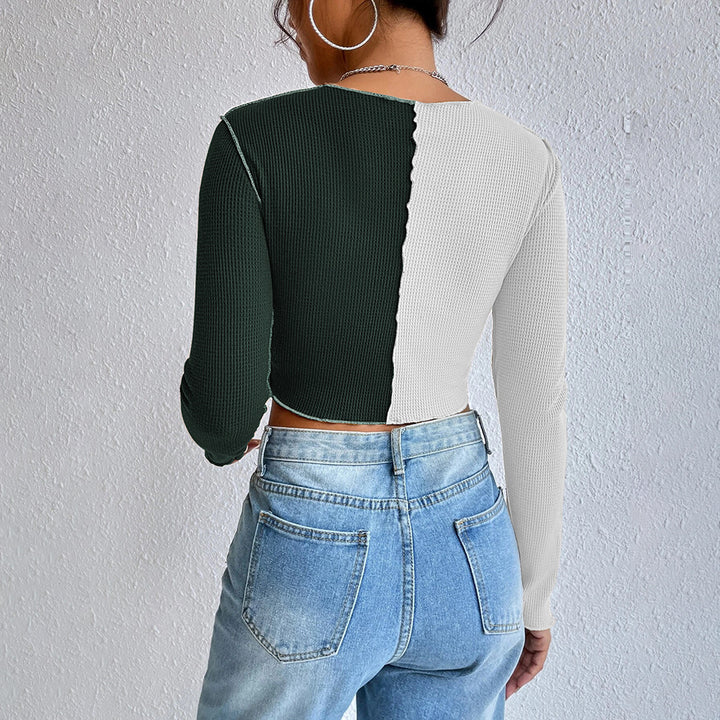 Kvinders cropped langærmet skjorte med to farver og fashionable rib design Stilla