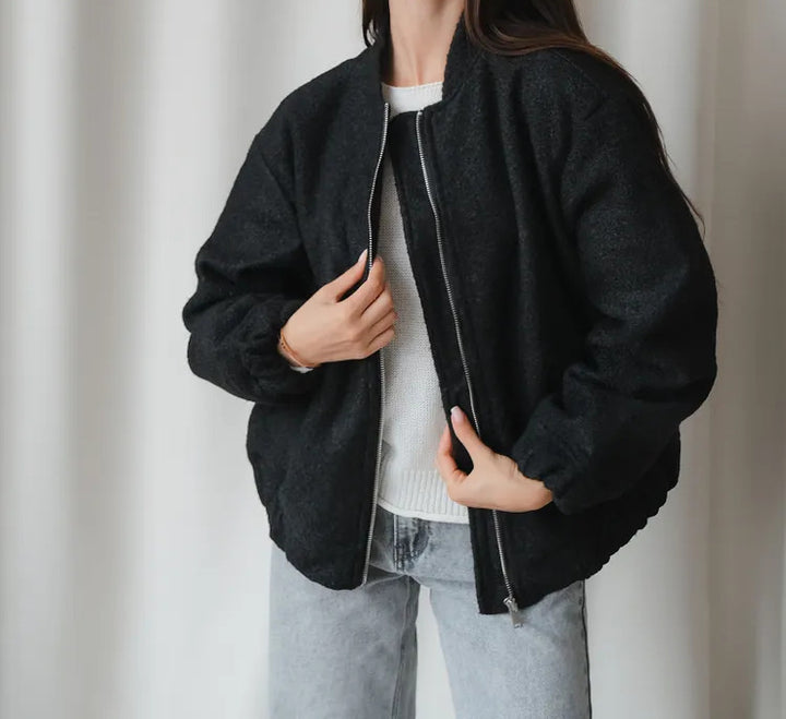 Dame overgangsjakke i varmt teddy-fleece med praktiske lommer og elastiske manchetter Stilla