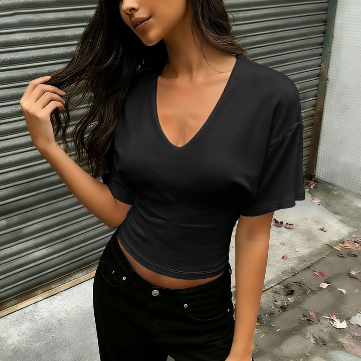 Dame afslappet cropped t-shirt med v-udskæring og oversized ærmer Skovae