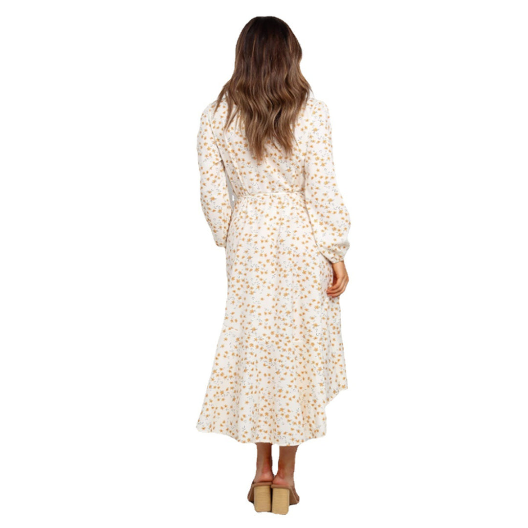 Women's wrap dress with playful floral print and flowing skirt Skovae