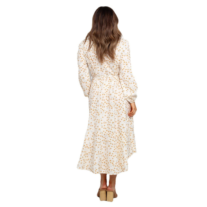 Women's wrap dress with playful floral print and flowing skirt Skovae