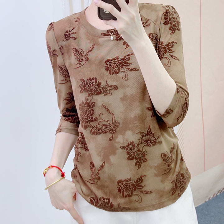 Dame mode blouse med 3/4-ærmer og blomster design Stilla