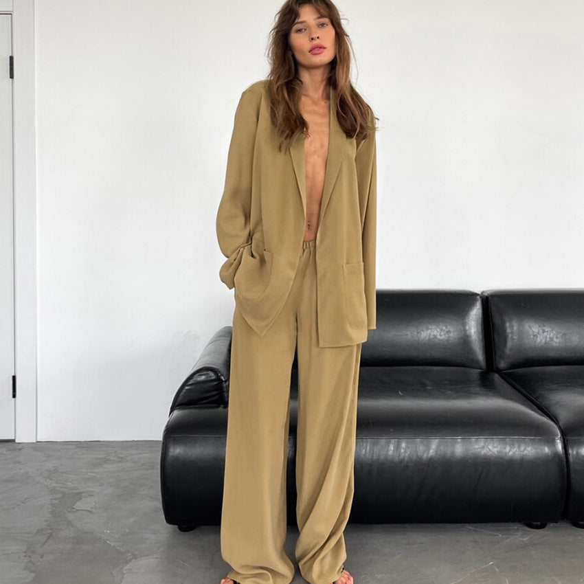 Damer elegant blazer- og bukseensemble med svingende snit og praktiske lommer Stilla