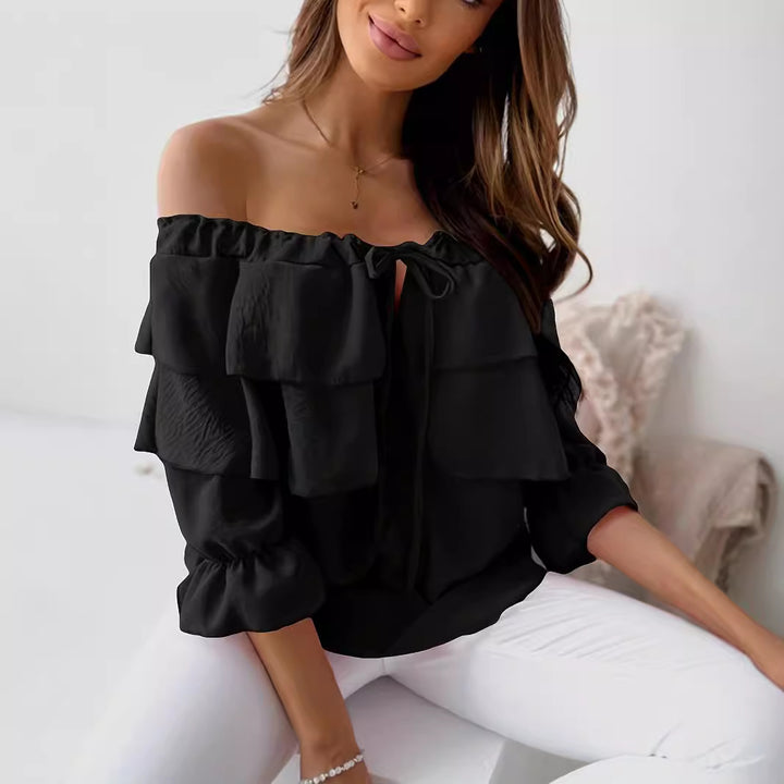 Kvinder legesyge top med flæse design og off-shoulder skæring Stilla