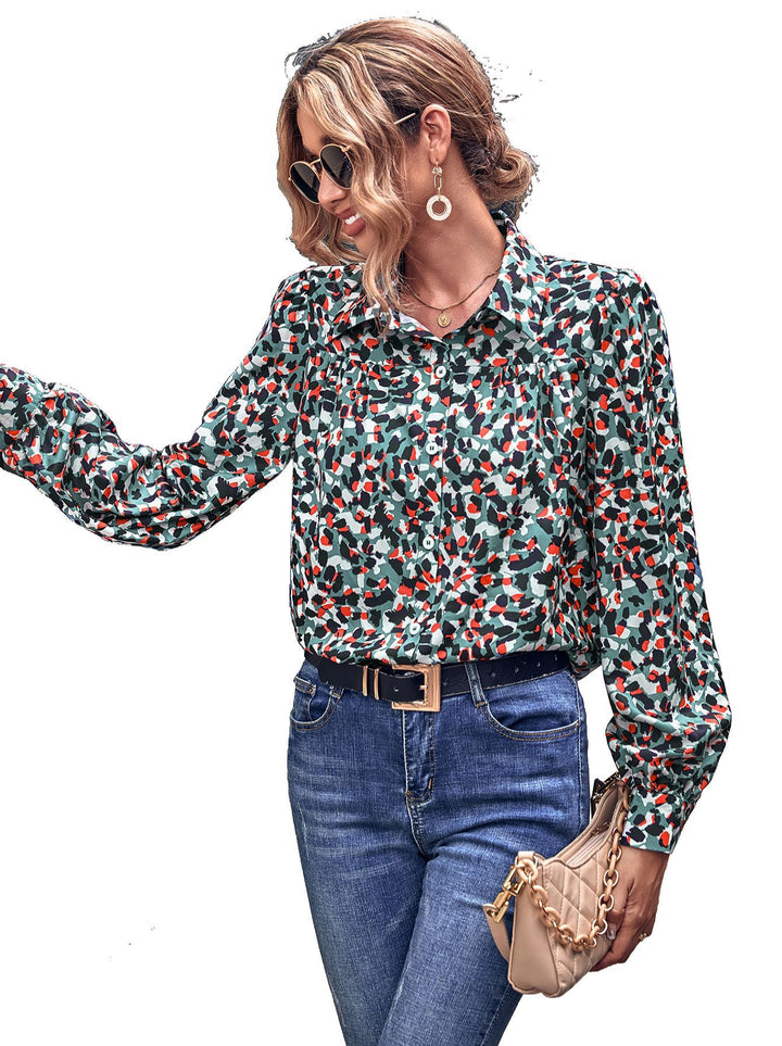 Kvinders bluse med blomsterprint og fashionable puffærmer Stilla
