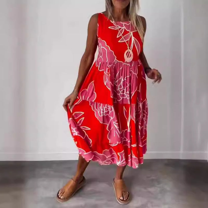 Dame Midikjole med asymmetrisk kant og blomstret print Stilla