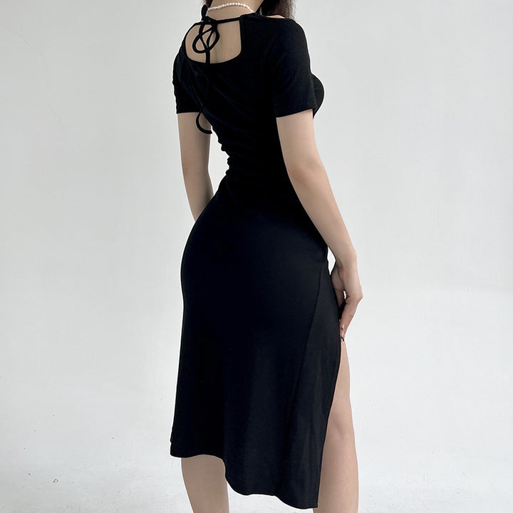 Dame figursyet Midi-kjole med moderne cut-out-detaljer og høj slids Stilla