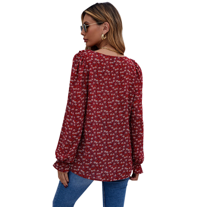 Kvinders bluse med flæsedetaljer og blomsterprint Stilla