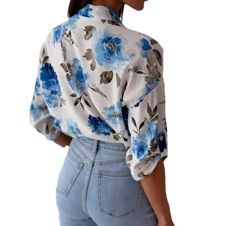 Damebluse med blomstermønster og dropped skuldre Stilla