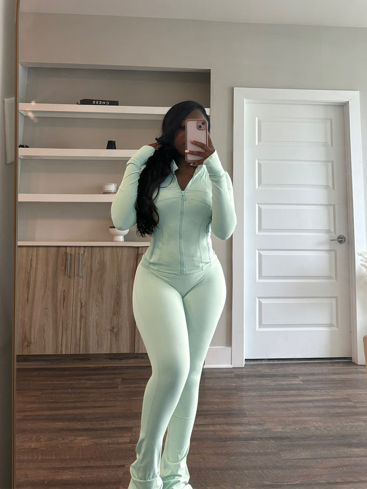 Damer Sporty Langeærmet Jumpsuit i Stretch-materiale med Lynlås Stilla