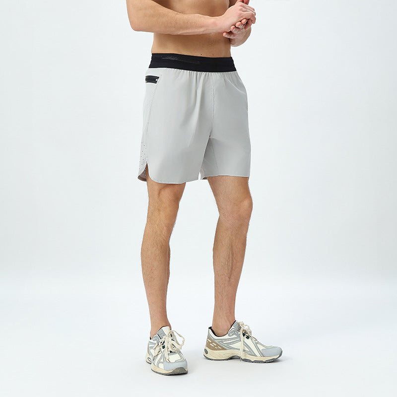 Herre åndbare sportshorts med elastisk linning og hurtigttørrende materiale Stilla