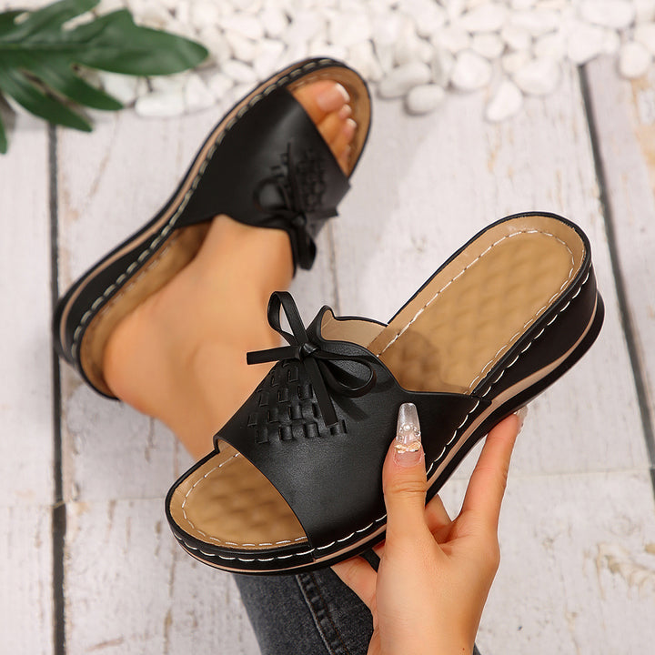 Dame Slide-sandaler med flettet overdel og dekorativt sløjfeaccent Stilla