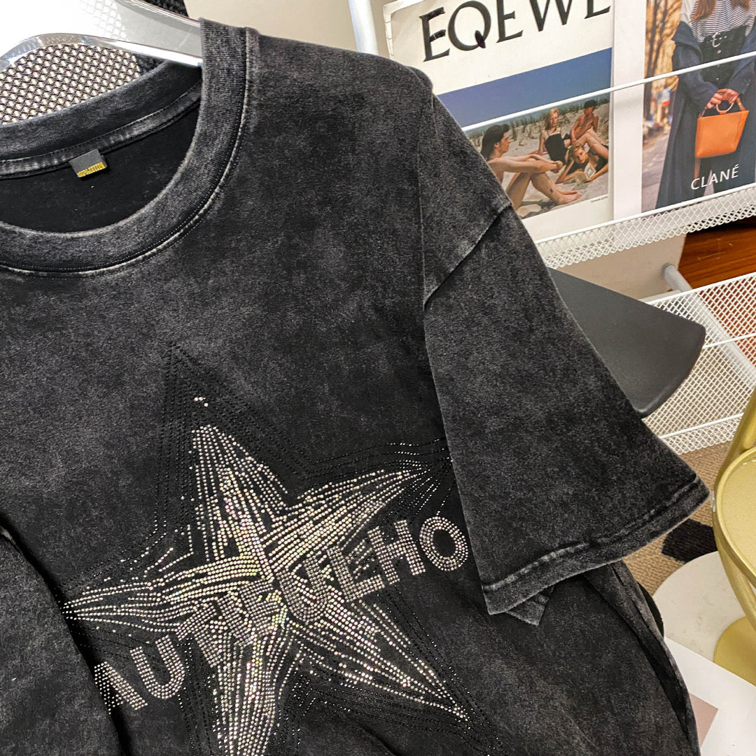 Dame T-shirt med funklende stjernemotiv og afslappet pasform Stilla