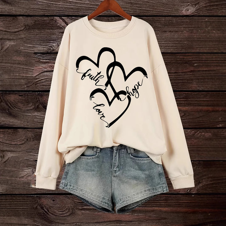 Kvindernes sweatshirt med romantisk hjertemotiv og inspirerende print Stilla