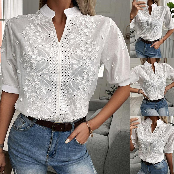 Dame broderet bluse med ståkrave og hulbroderi Stilla