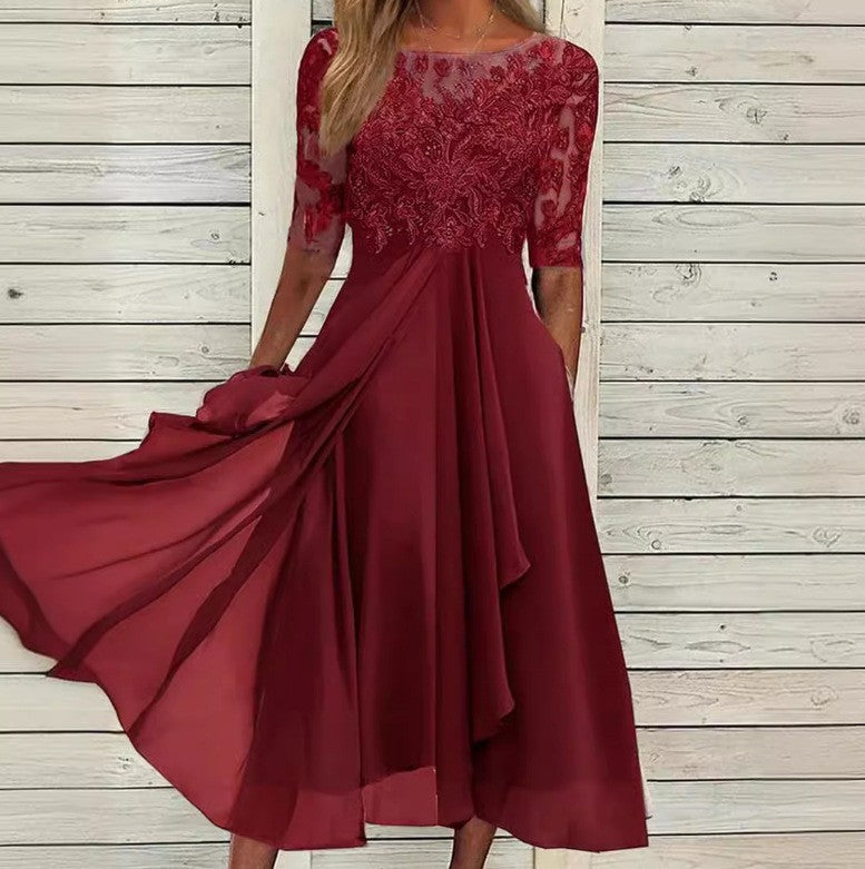 Dame elegant cocktailkjole med floralt spidsetop og flydende skørt Stilla