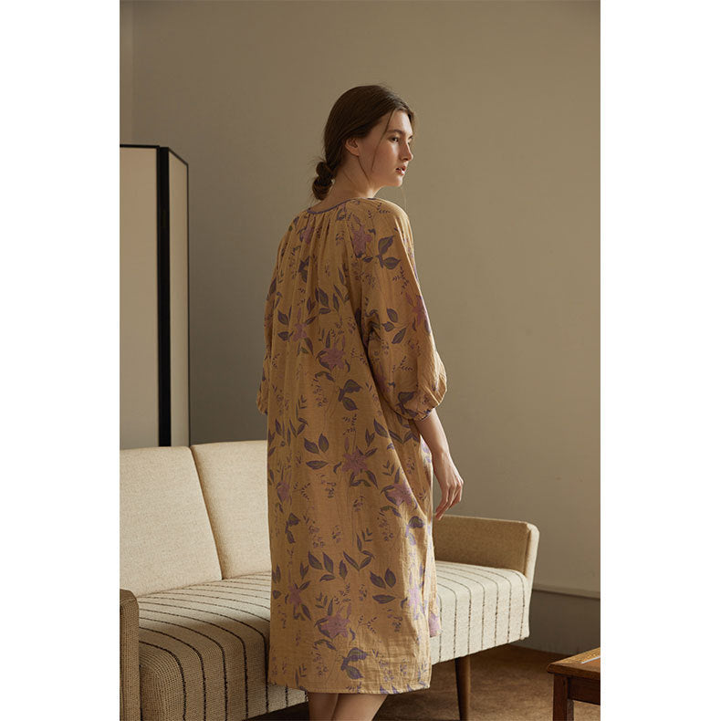 Dame huskjole med elegant blomsterdesign og praktiske lommer Stilla