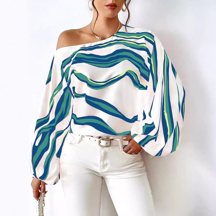 Dame Off-Shoulder-bluse med voluminøse ærmer og moderne stribemønster Stilla