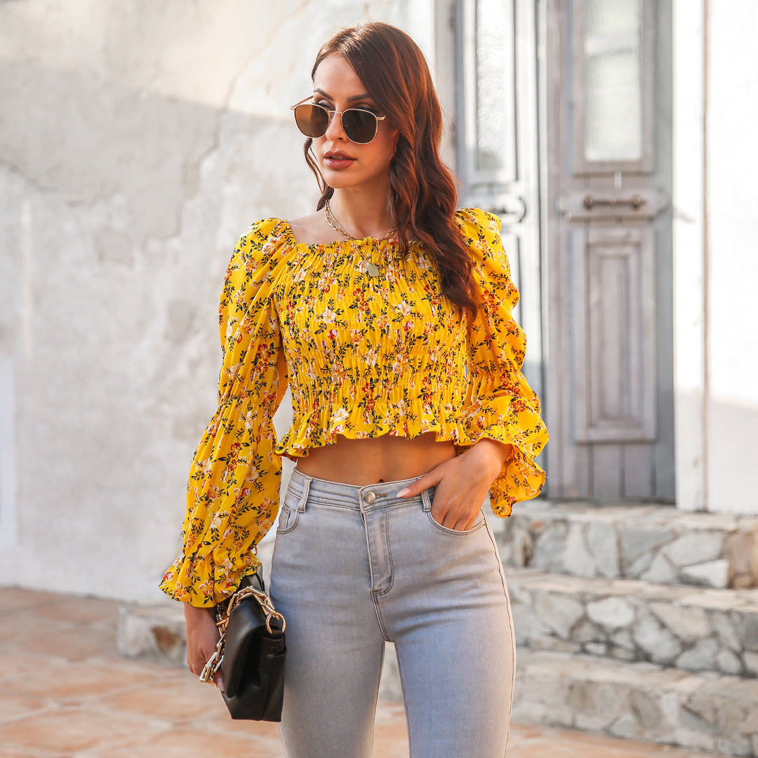Damebluse med voluminøse ærmer og blomsterprint Stilla