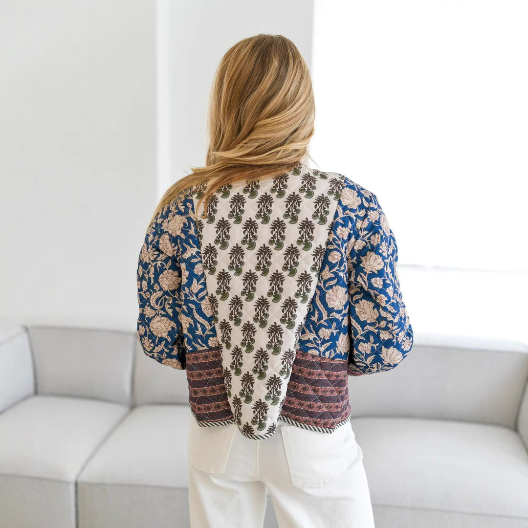 Dame patchwork-jakke med blomstrede mønstre og elegante detaljer Stilla