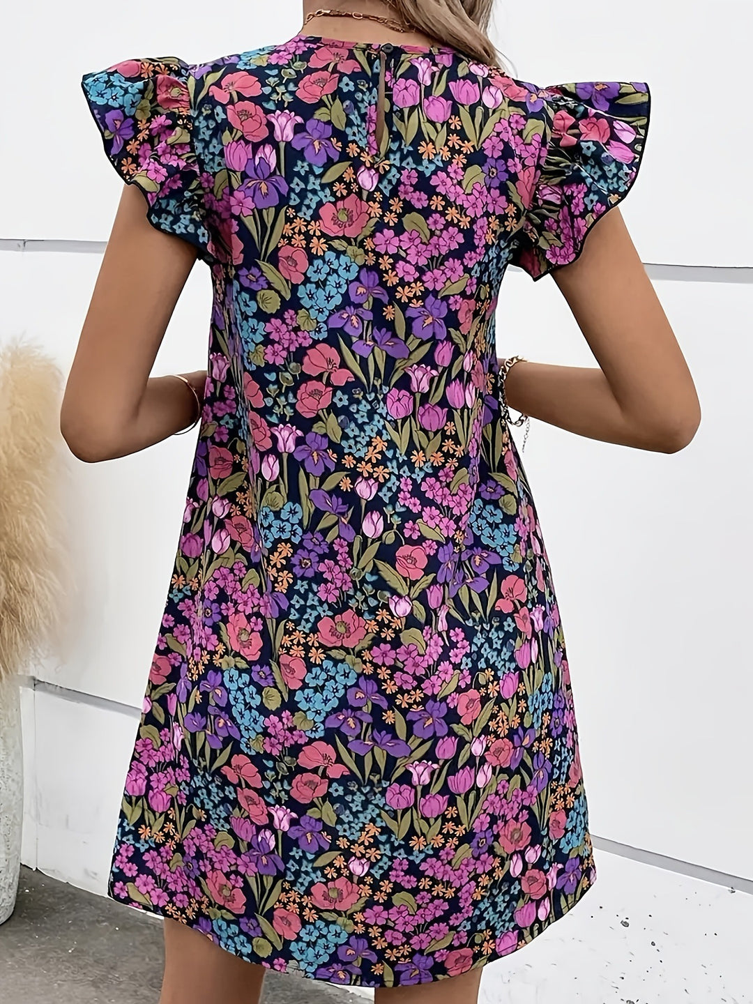 Dame Minikjole med voluminøse puffærmer og farverigt blomsterprint Stilla