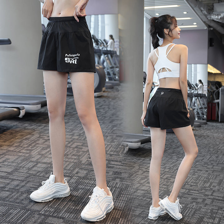 Dame Sporty Løbeshorts med sideventilation og elastisk talje Stilla