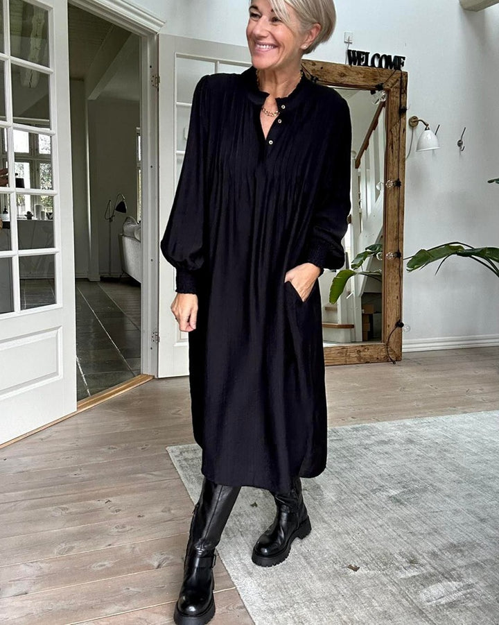 Dame Midikjole med elegant folderstruktur og praktiske lommer Stilla