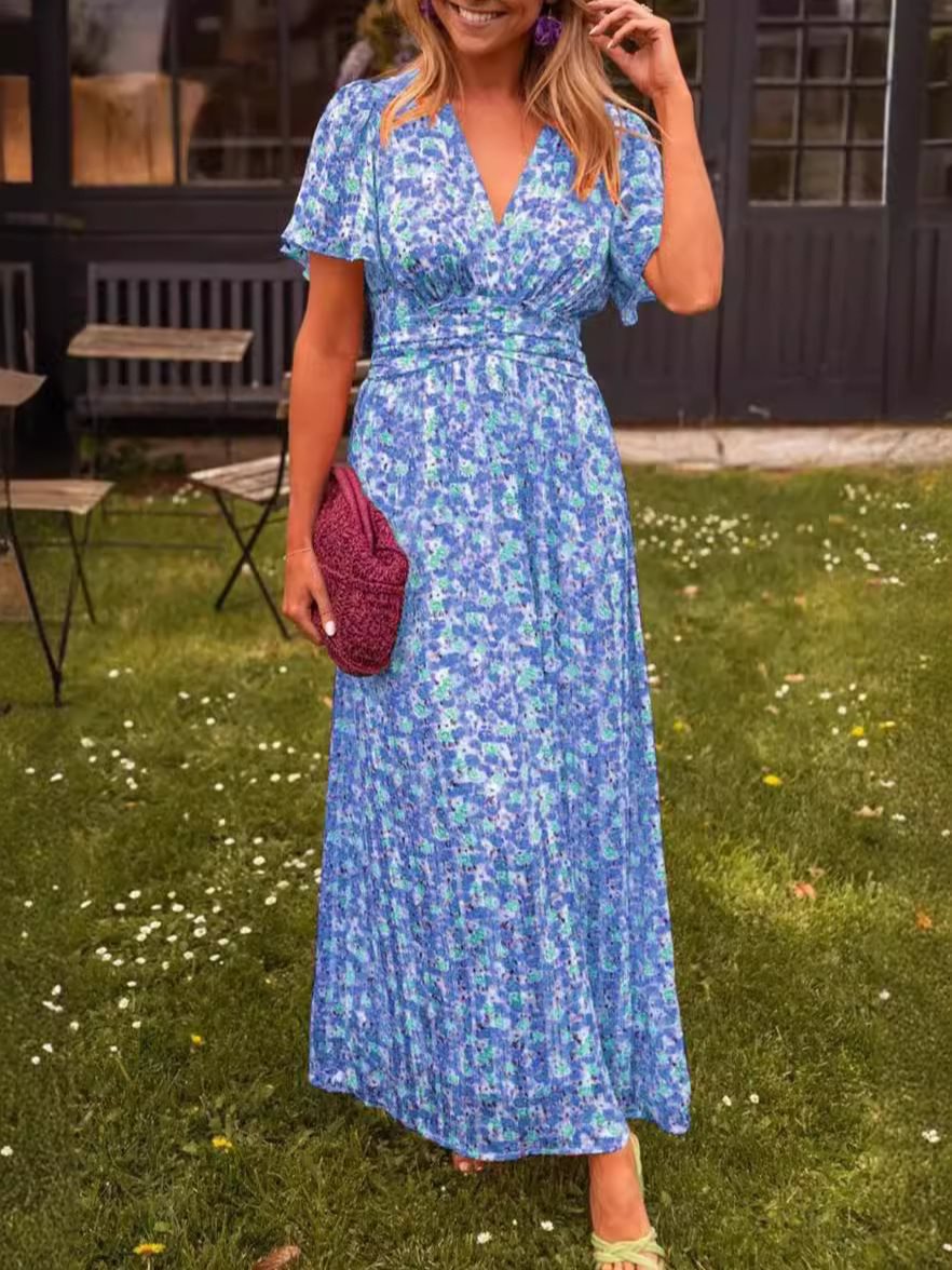 Dame maxikjole med elegant V-udskæring og legesyg puffærme Stilla