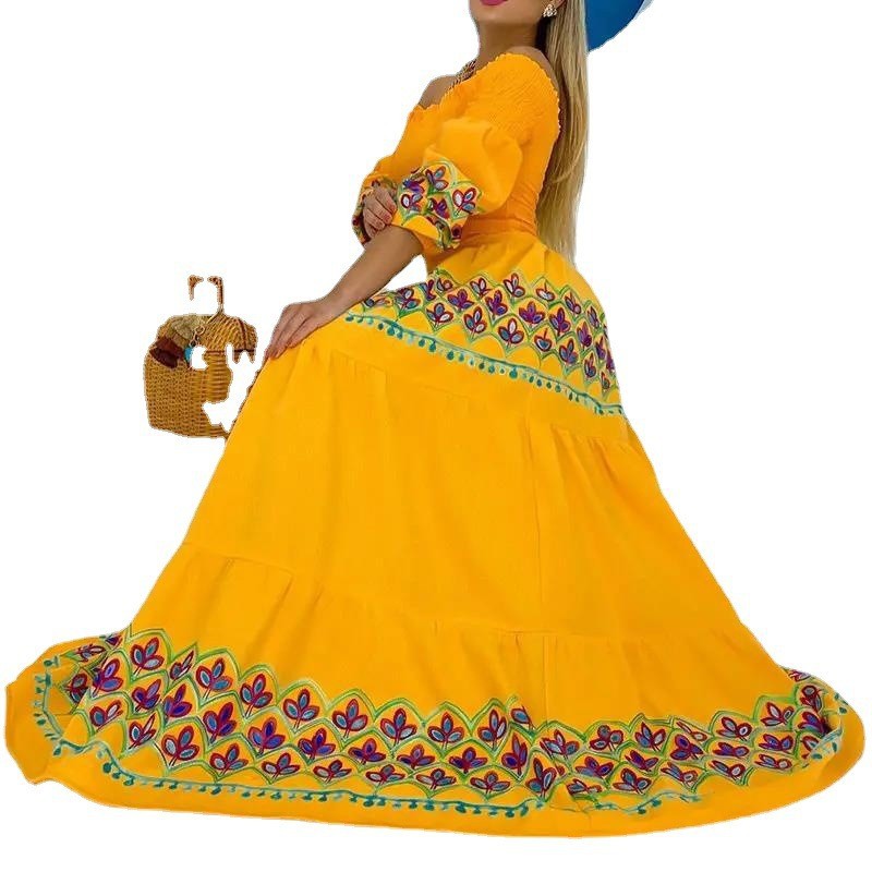 Dame Maxikjole med elastisk Off-Shoulder-udskæring og farverige broderier Stilla